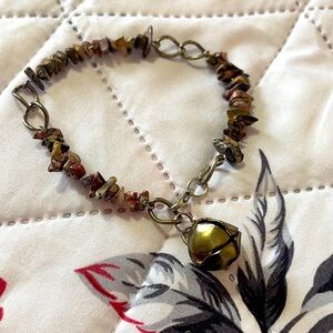 Vintage-Inspired Handmade freshwater stone bracelet, with a bell charm.